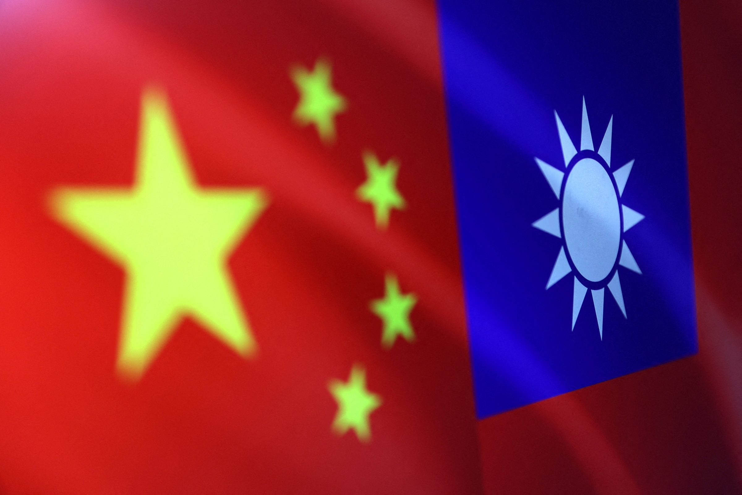 Taiwan activates air defense as China aircraft enter zone