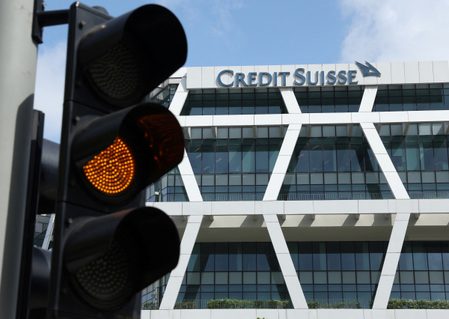 Stunned Credit Suisse staff fear uncertain future despite UBS rescue deal