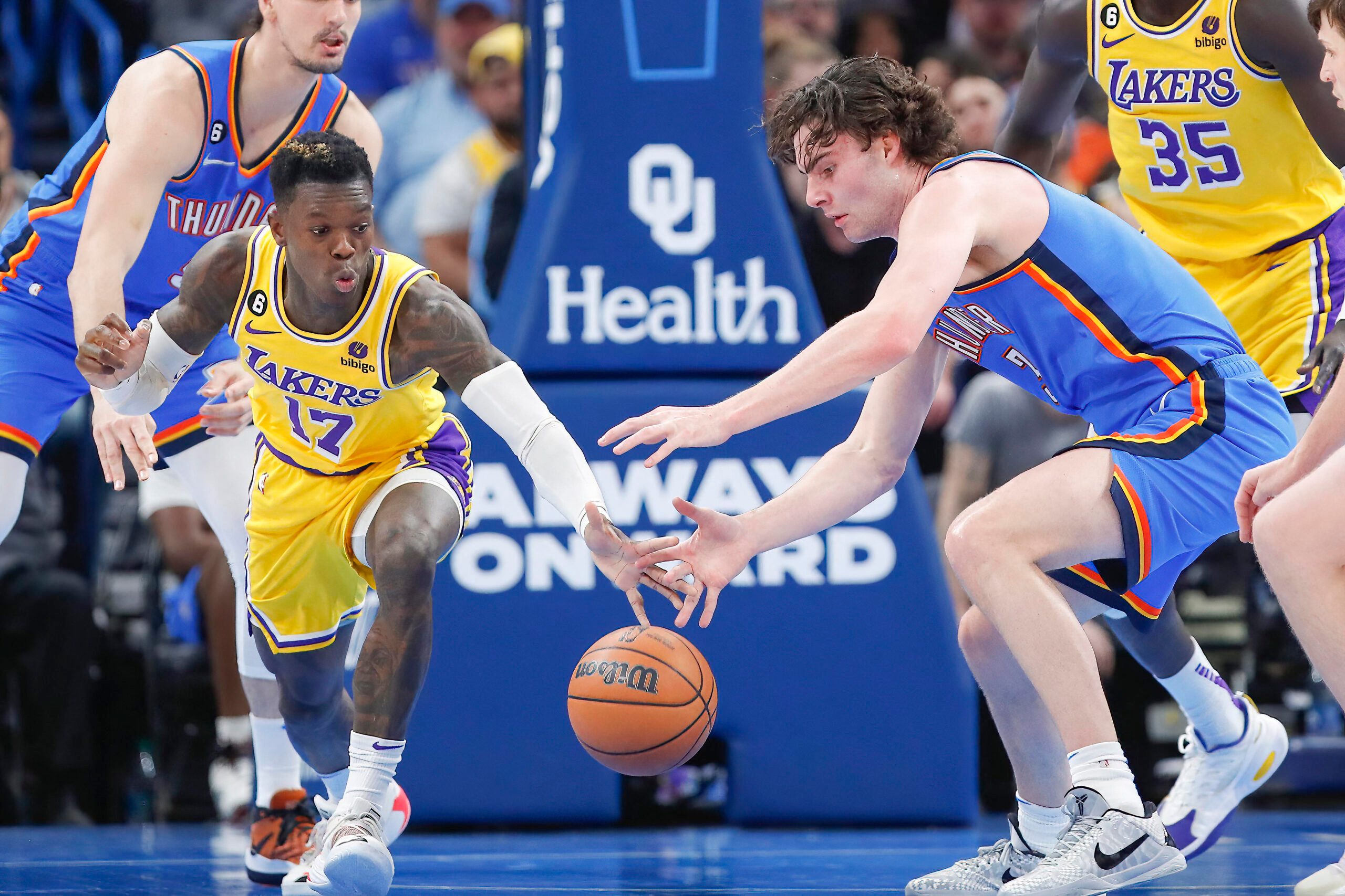 Missing 2 superstars, Lakers get past Thunder