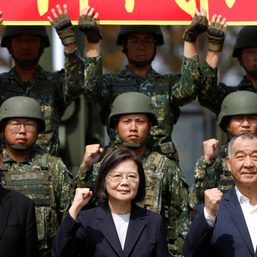 Taiwan president reviews troops ahead of sensitive US visit