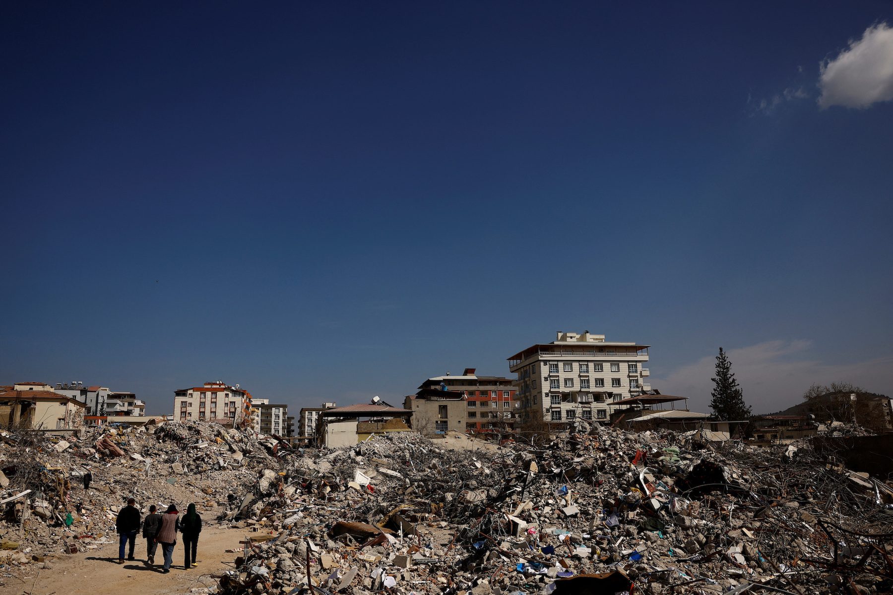 Turks ask how a boom town came crashing down in quake