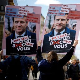 France’s Macron signs contested pension law as unions plan more protests