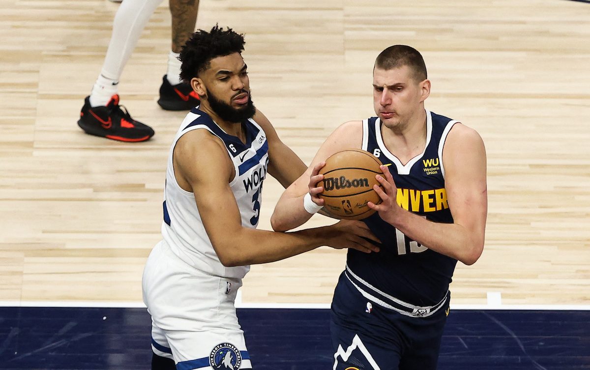 Wolves hold off Nuggets in OT, survive another day