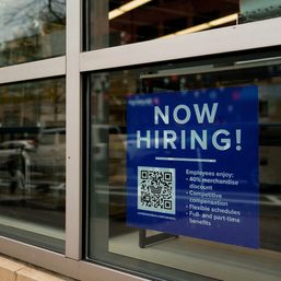 US economy still churning out jobs at brisk clip; wage pressures subsiding