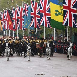 King Charles’ coronation draws tens of thousands braving rain to cheer monarch