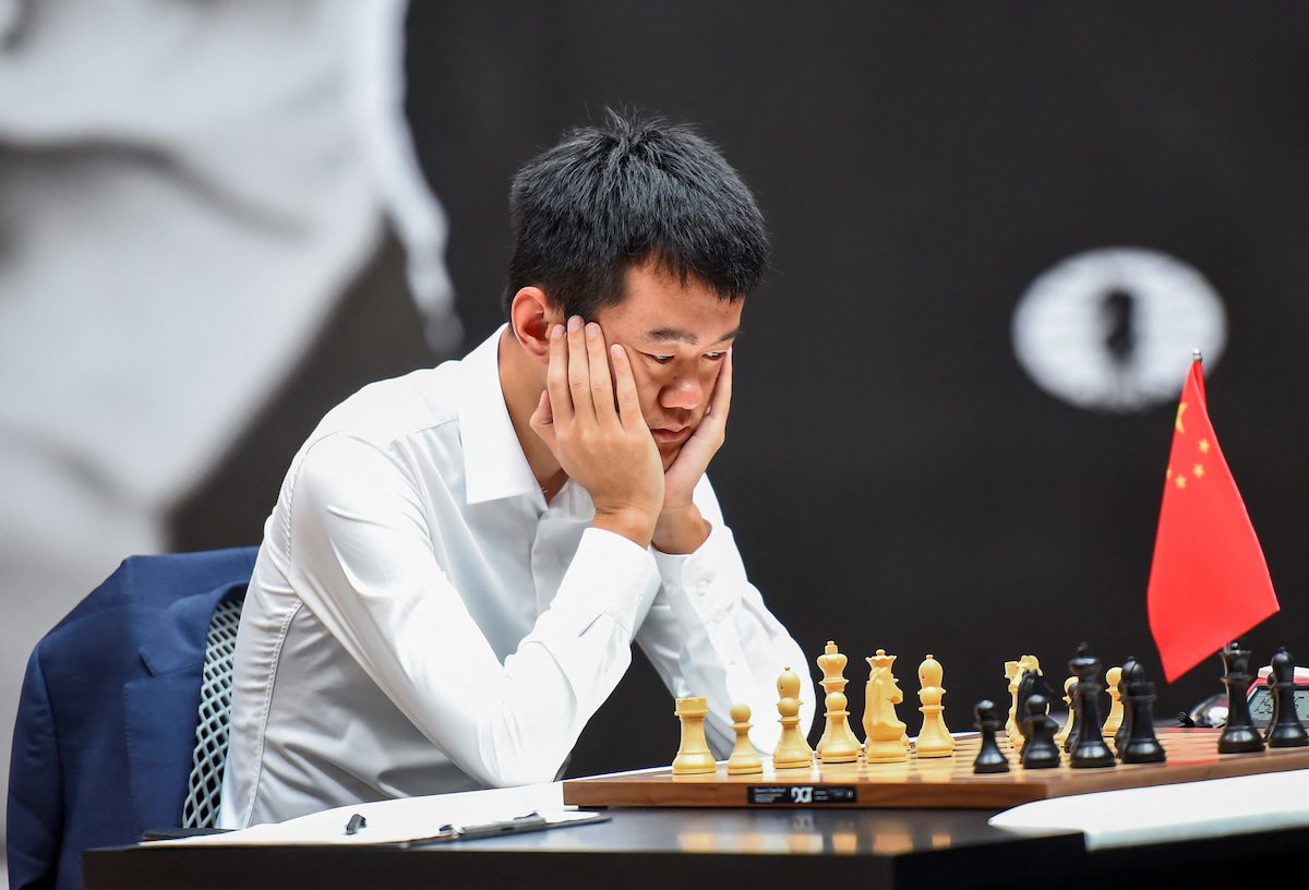 China’s Ding Liren defies odds to become chess world champion as Magnus Carlsen gives up throne