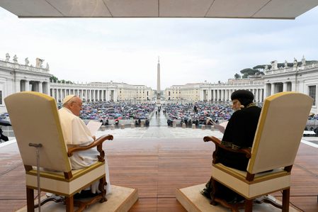 Rare day at Vatican as two popes share stage