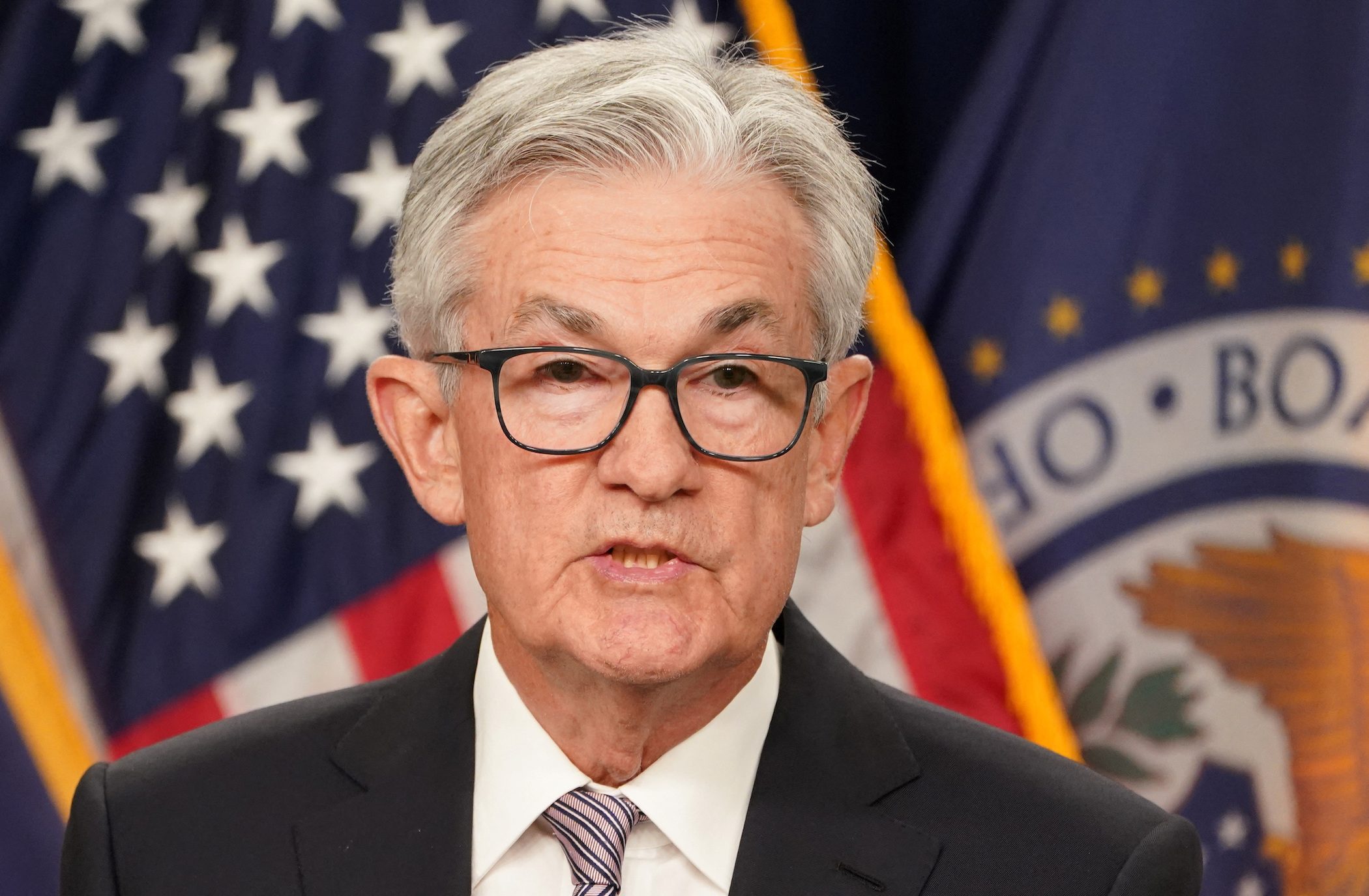 Fed’s Powell says risks more balanced, June policy decision unclear