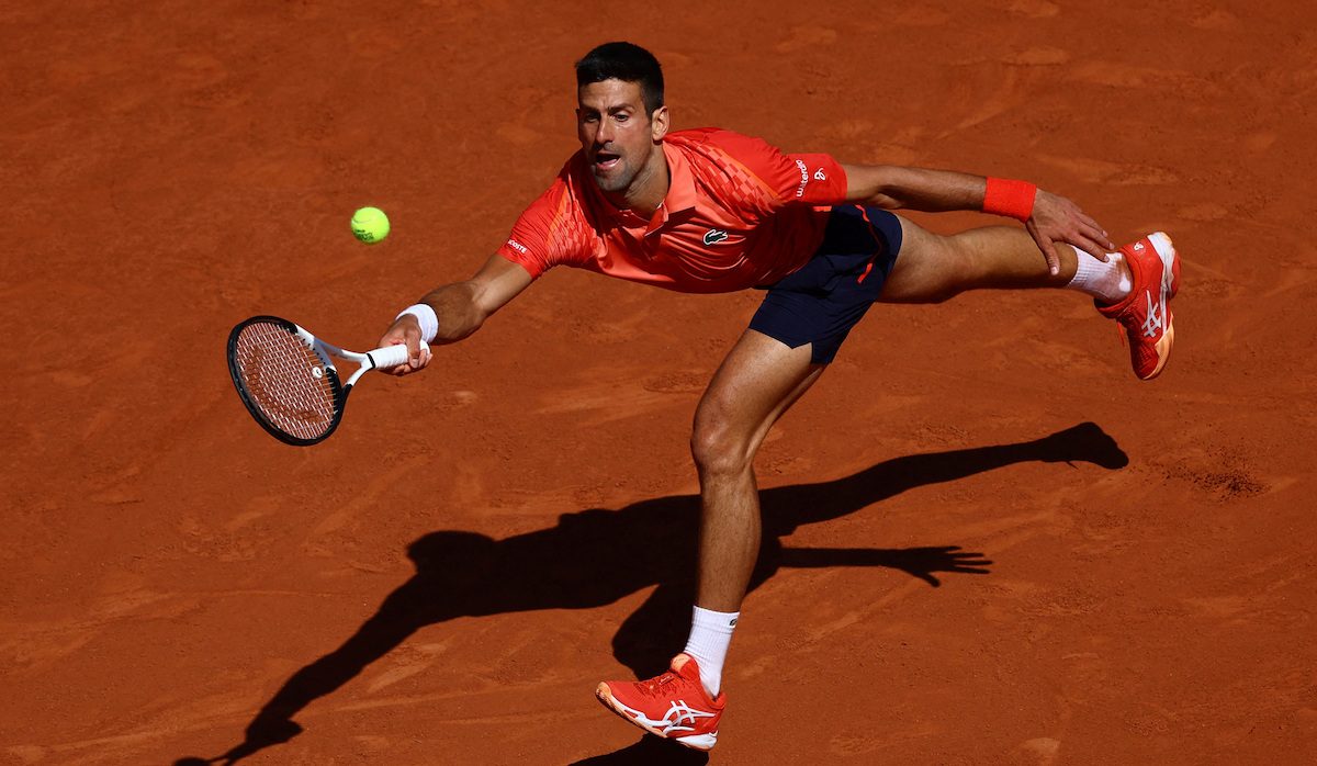 Djokovic edges closer to Grand Slam record with spot in French Open quarters