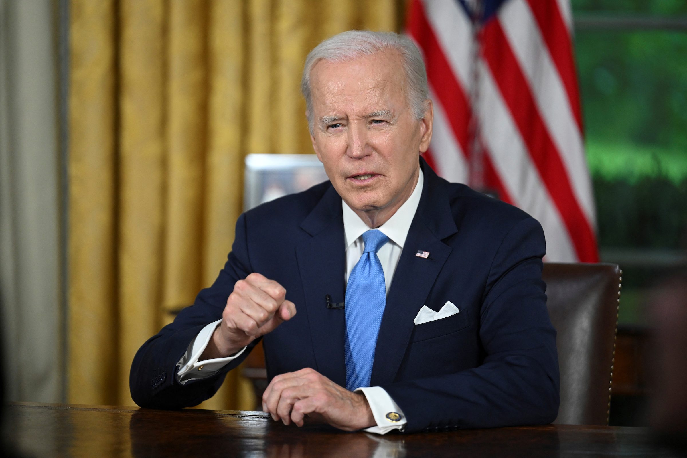 Biden signs debt limit bill, avoiding US default
