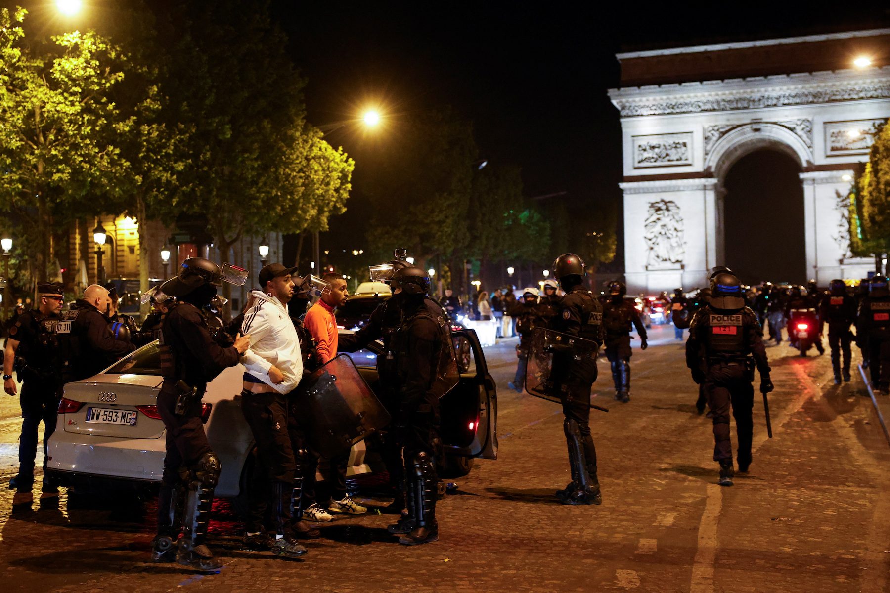 Sporadic violence, but calmer night in France after family buries teenager