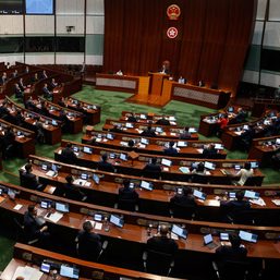 Hong Kong slashes directly elected seats in local polls, further reducing democracy