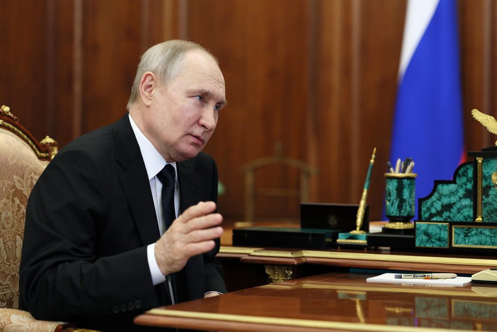 Russian President Vladimir Putin meets with Health Minister Mikhail Murashko in Moscow