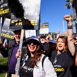 Striking actors reach tentative agreement with Hollywood studios to end strike