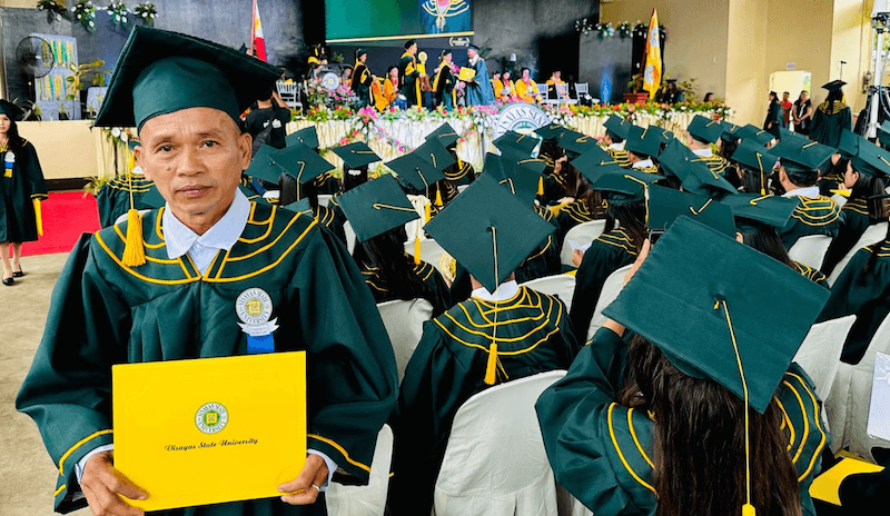 Leyte village secretary completes college degree at 55
