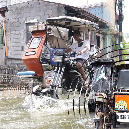 How Bulacan tricycle drivers rise above the coastal flood