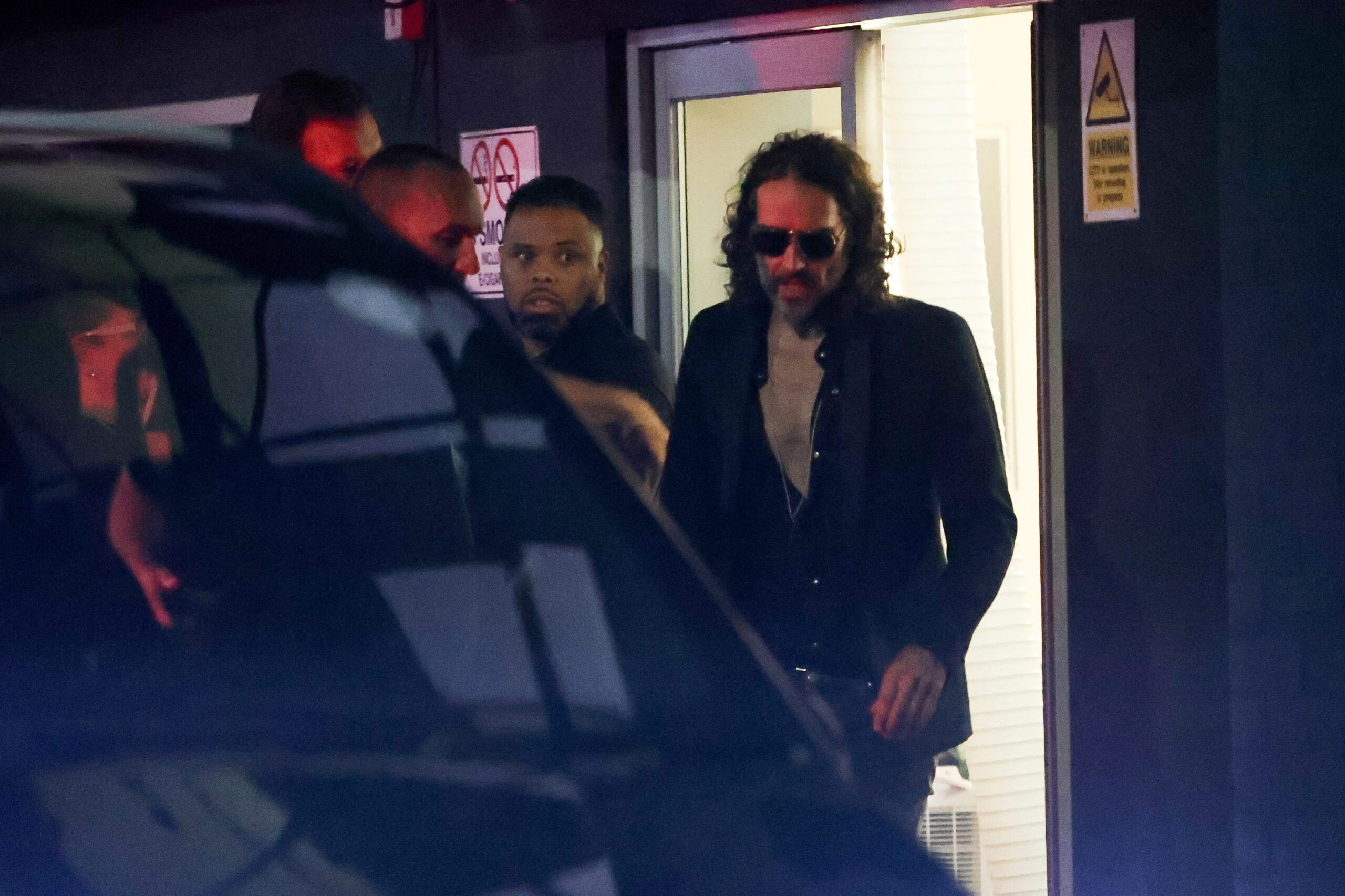 UK comedian Russell Brand denies media allegations of sex assaults picture image