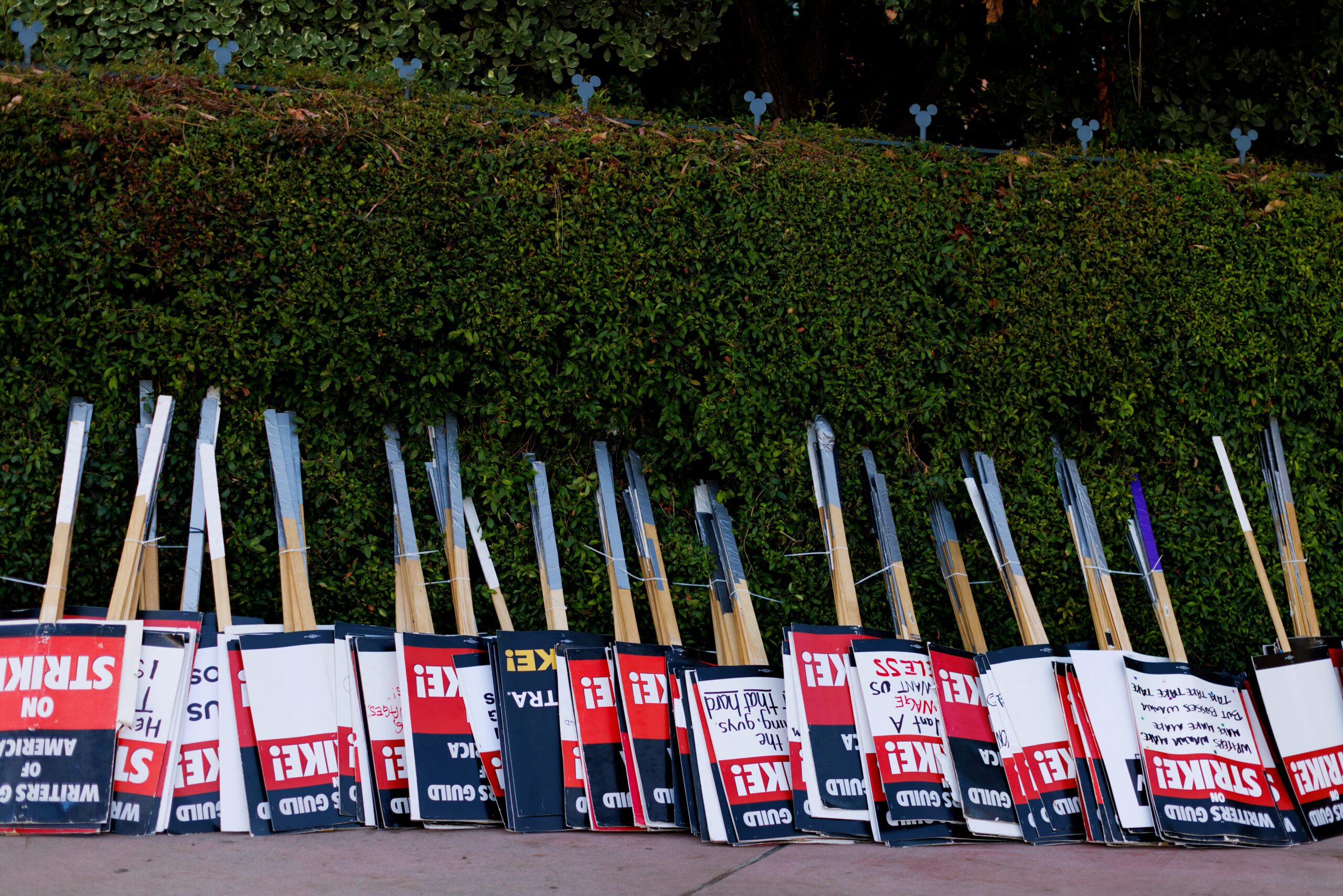 Hollywood workers resort to flea markets, bake sales as strikes drag on