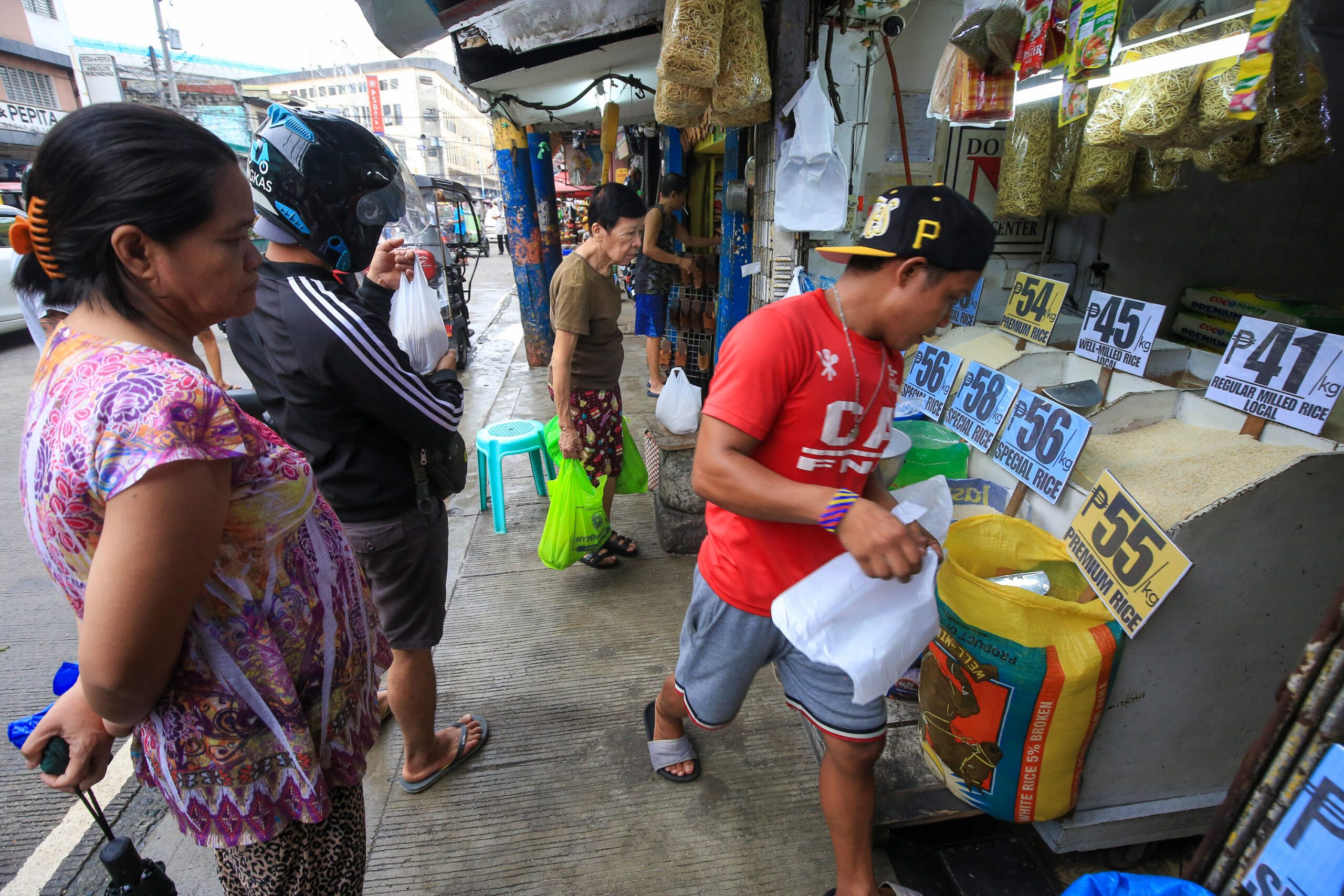 As consumers cheer, retailers bear brunt of rice price cap