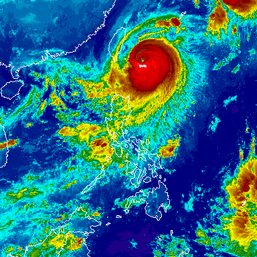 Typhoon Jenny slightly weakens, begins turning toward southern Taiwan