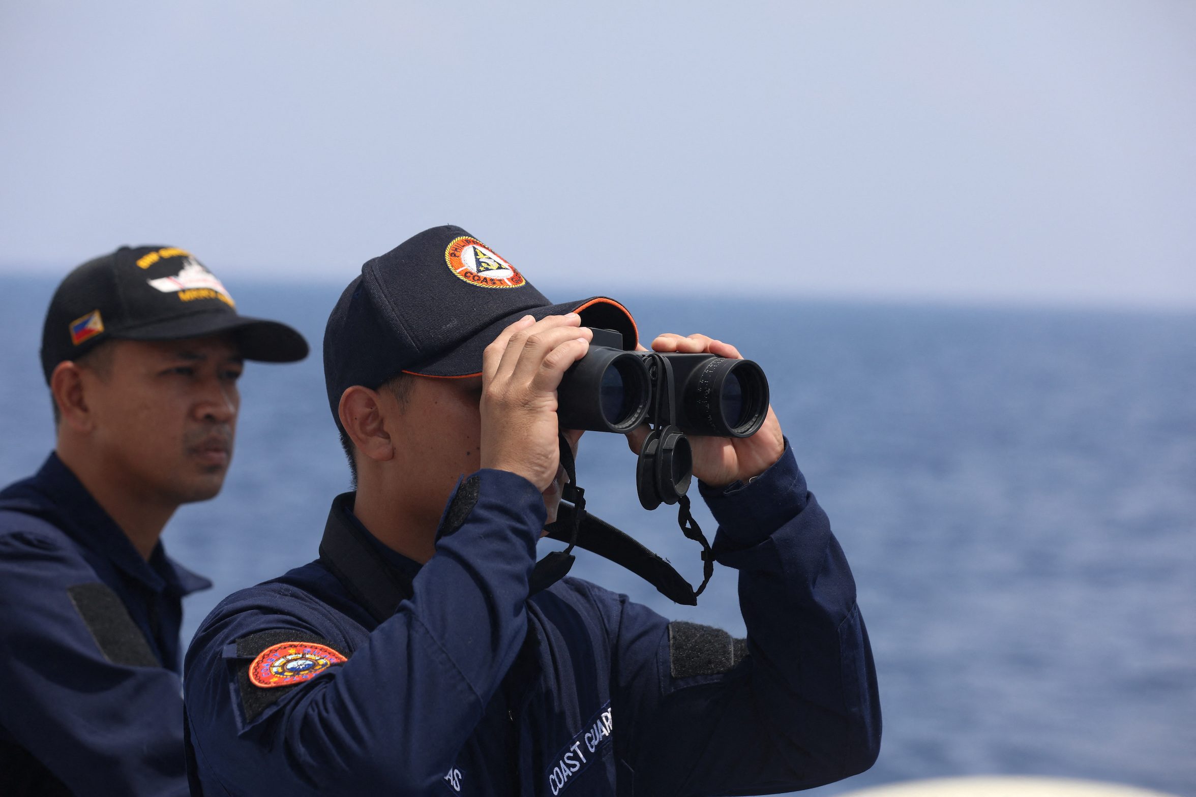 Near collision, tense encounter as Beijing flexes muscles in the South China Sea