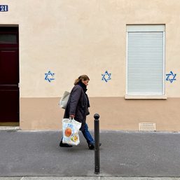 France accuses Russia of ‘online meddling’ over Stars of David graffiti in Paris