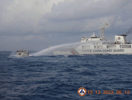 Philippines says China rammed, water cannoned resupply vessels
