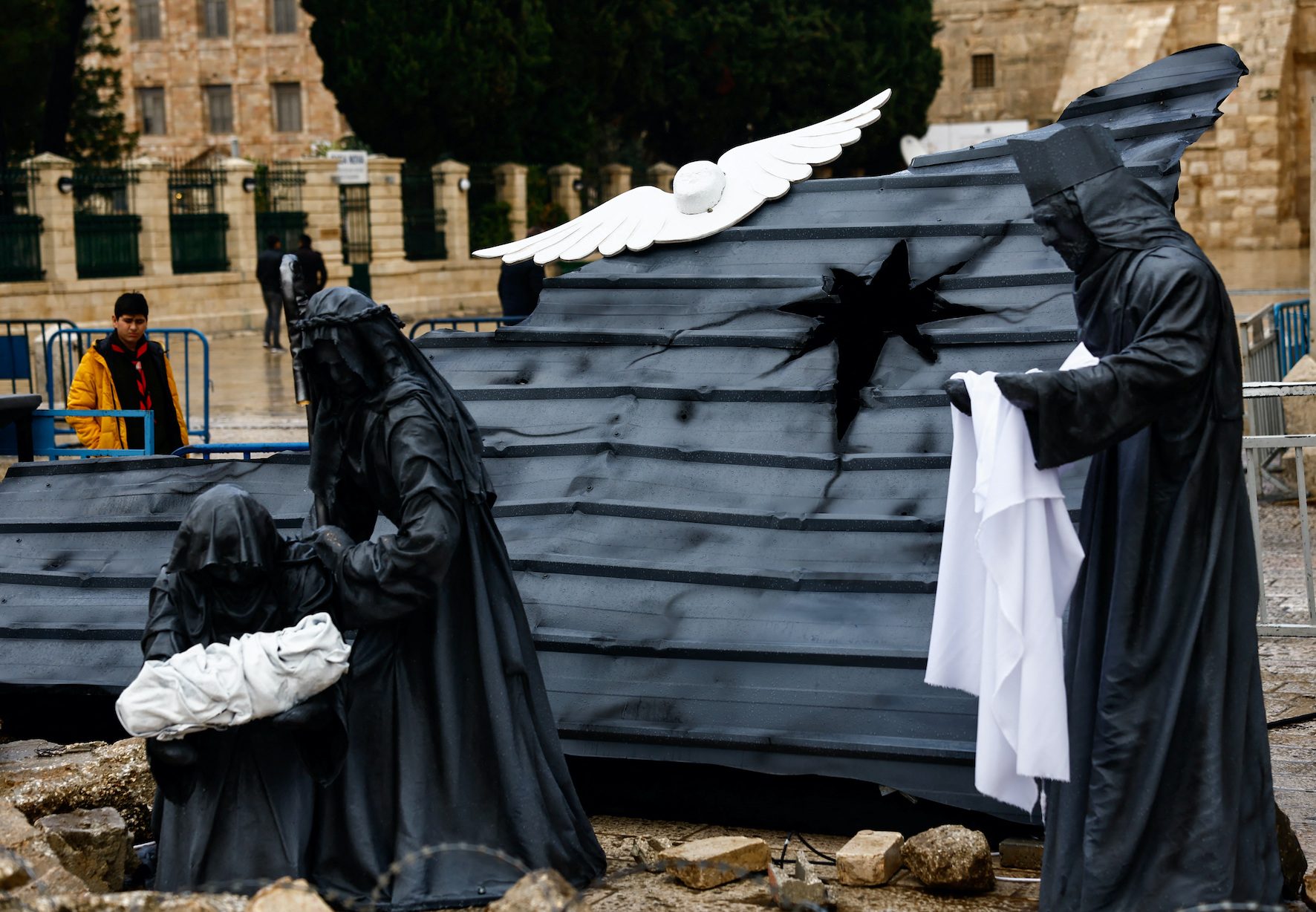 Somber Bethlehem marks Christmas with vigil as bombs rain on Gaza