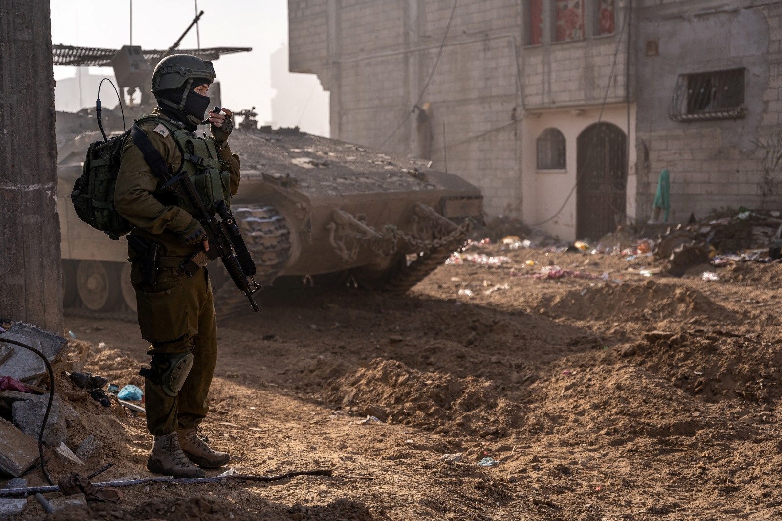Fighting across Gaza as Israel drops leaflets seeking its hostages