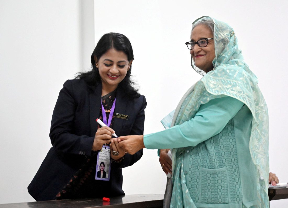 Bangladesh PM Hasina votes in general election boycotted by opponents