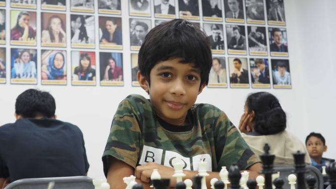 8-year-old chess prodigy becomes youngest to beat grandmaster