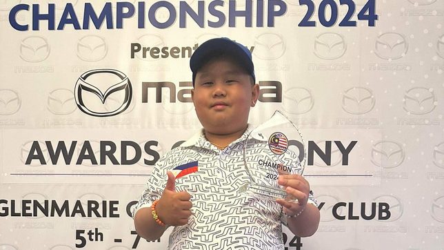 7-year-old golf wonder De Guzman rules in Kuala Lumpur, earns ticket to US meet