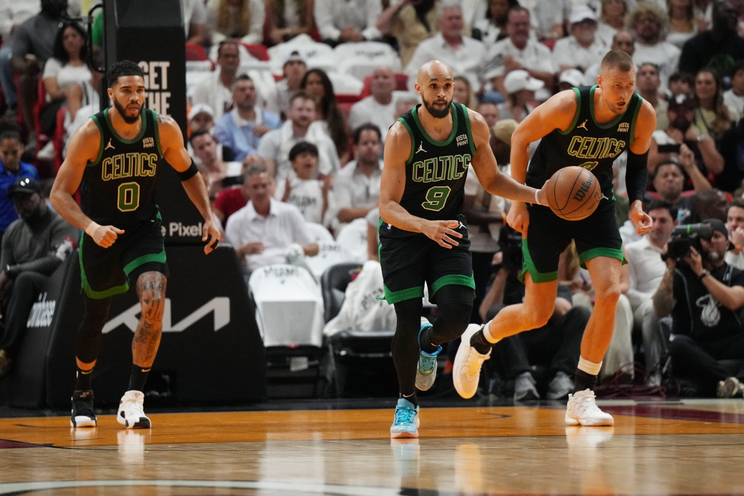Red-hot White powers Celtics past Heat with 38 points, 8 threes; Porzingis goes down anew