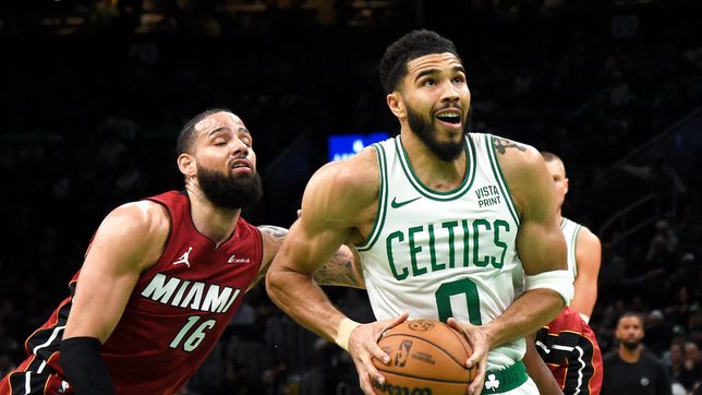 Tatum delivers triple-double as Celtics start fast, roll past Heat in Game 1 rout