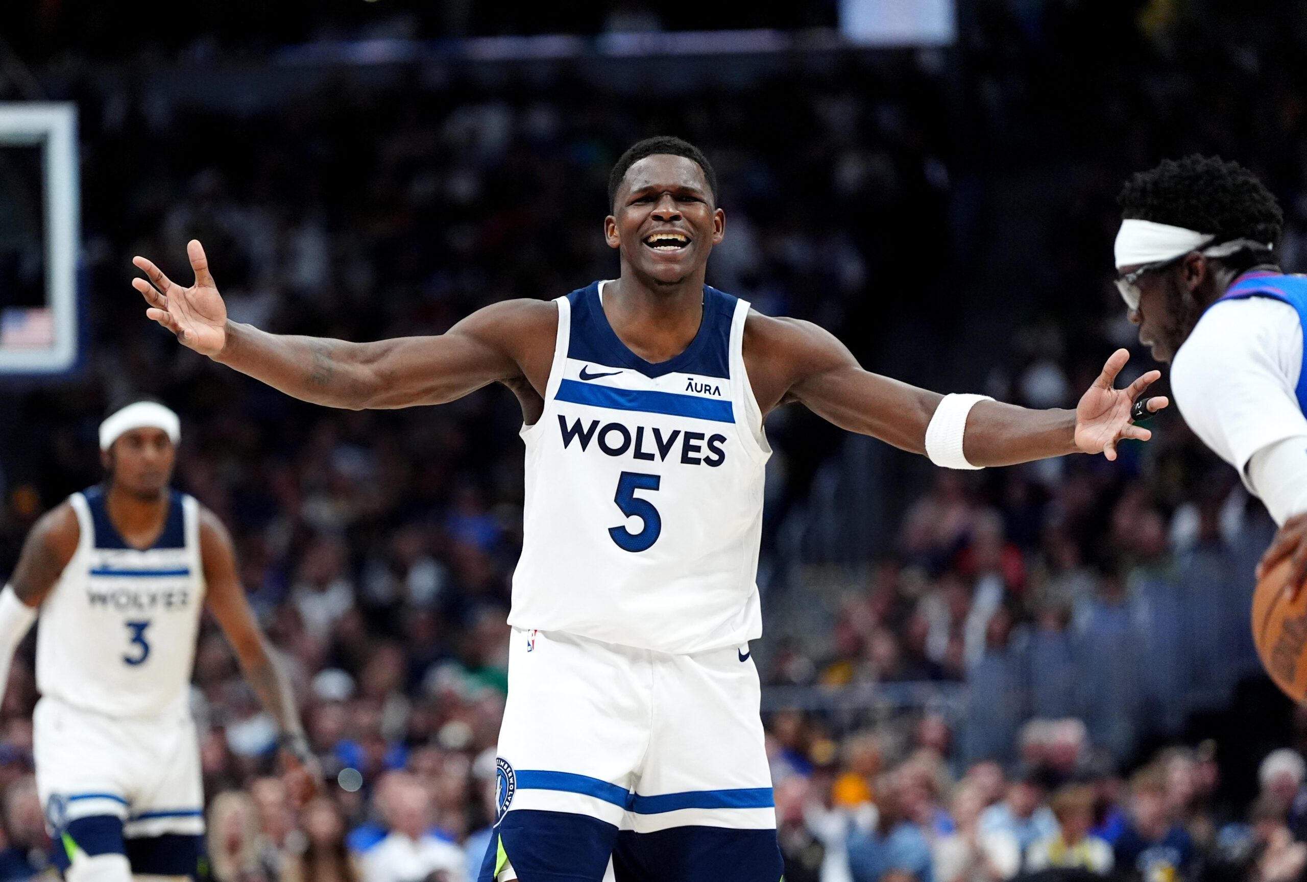 Wolves wrestle home-court advantage from Nuggets with Game 1 upset