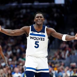 Wolves wrestle home-court advantage from Nuggets with Game 1 upset