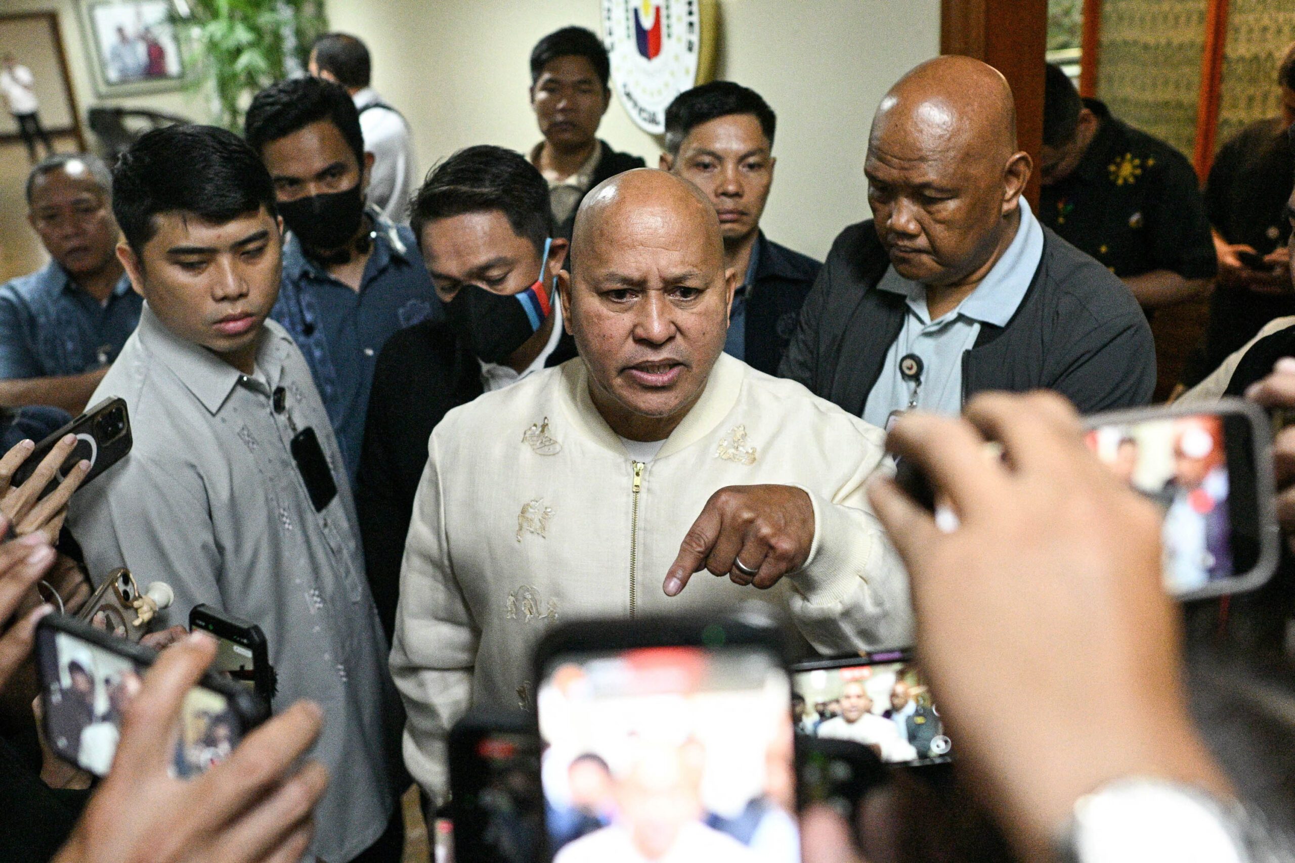 Senator Ronald dela Rosa talks to journalists at the Senate