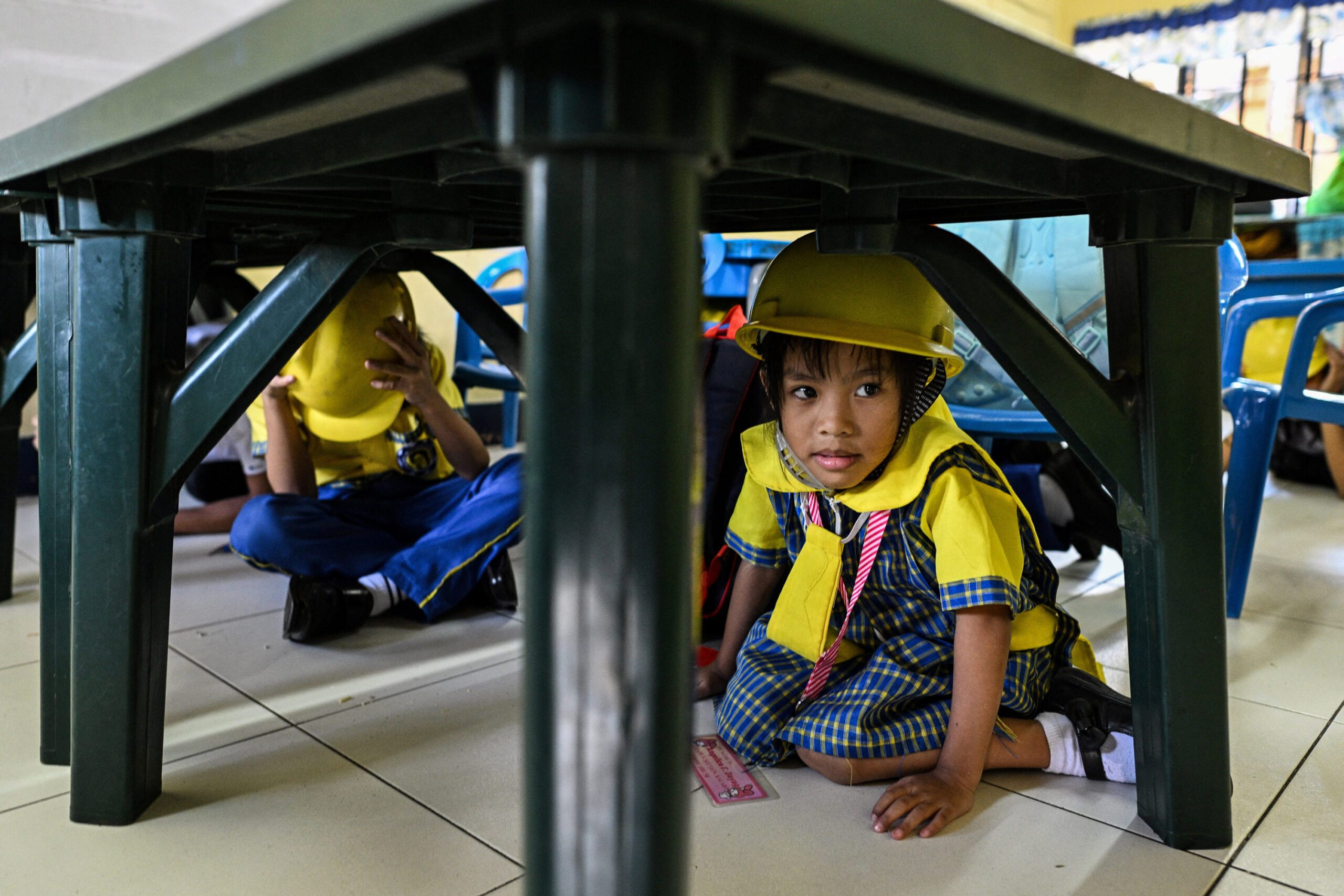 Students participate in a National Simultaneous Earthquake Drill