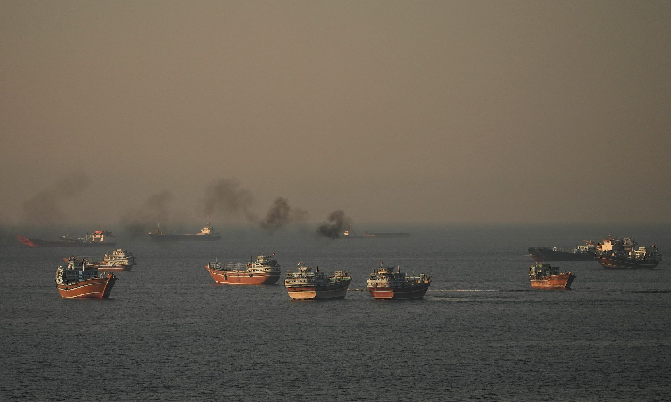 First tankers cross strait after Iran deal; Israeli strikes stir doubt in Lebanon