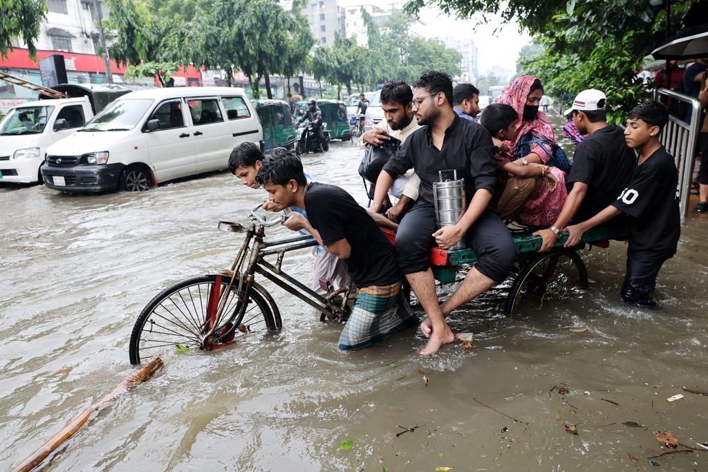 Torrential rain flooded the streets of Dhaka