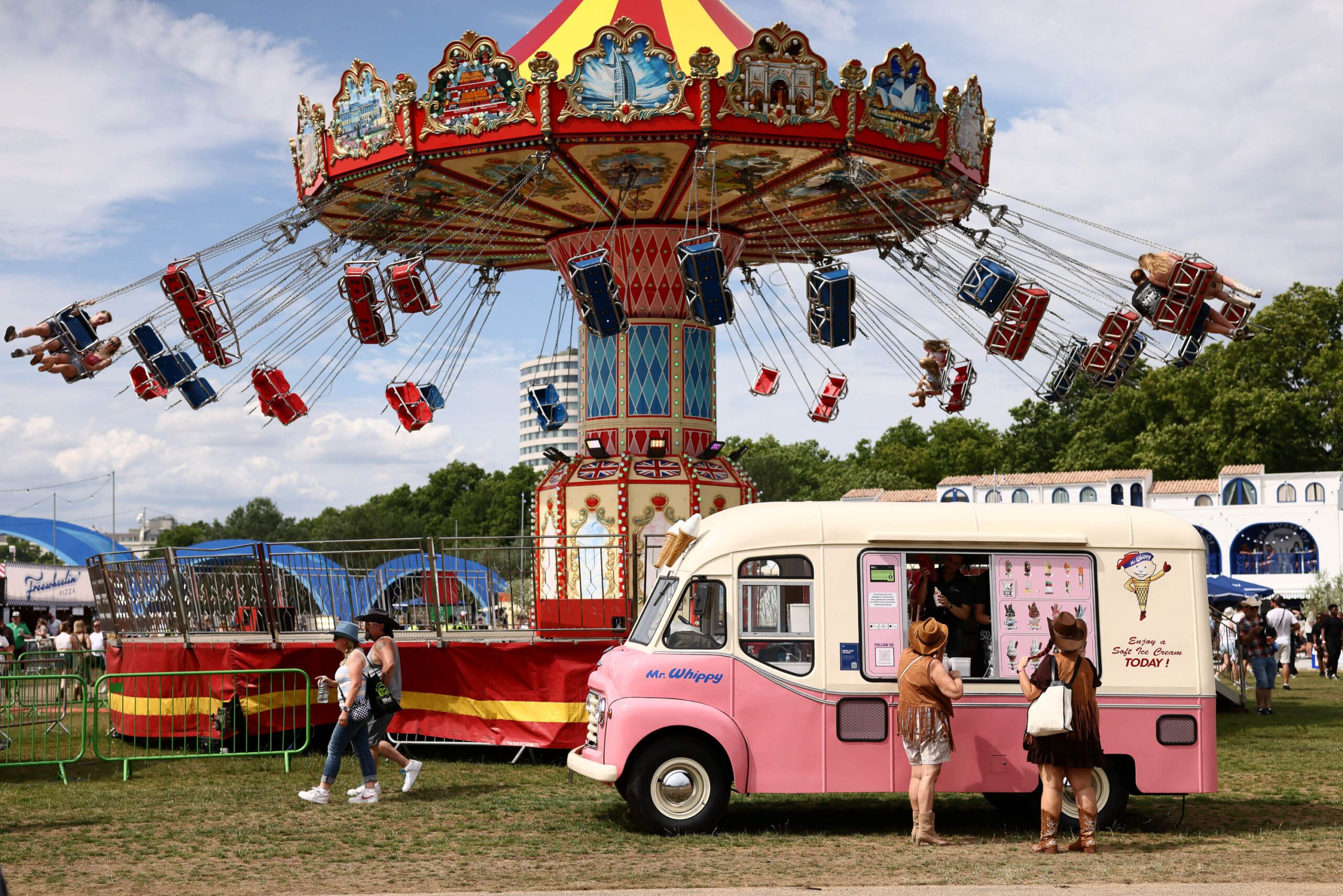 Country music fans on the first day of BST Hyde Park as an amber extreme heat warning remains in place over southeast England