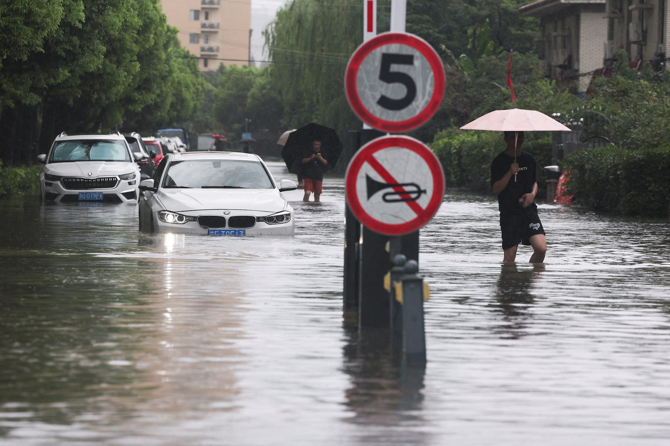 Rain pounds Beijing as Typhoon Dolphin sweeps through China