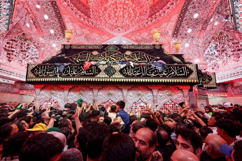 Worshippers pray inside Imam Hussein shrine ahead of Arbaeen pilgrimage in Karbala