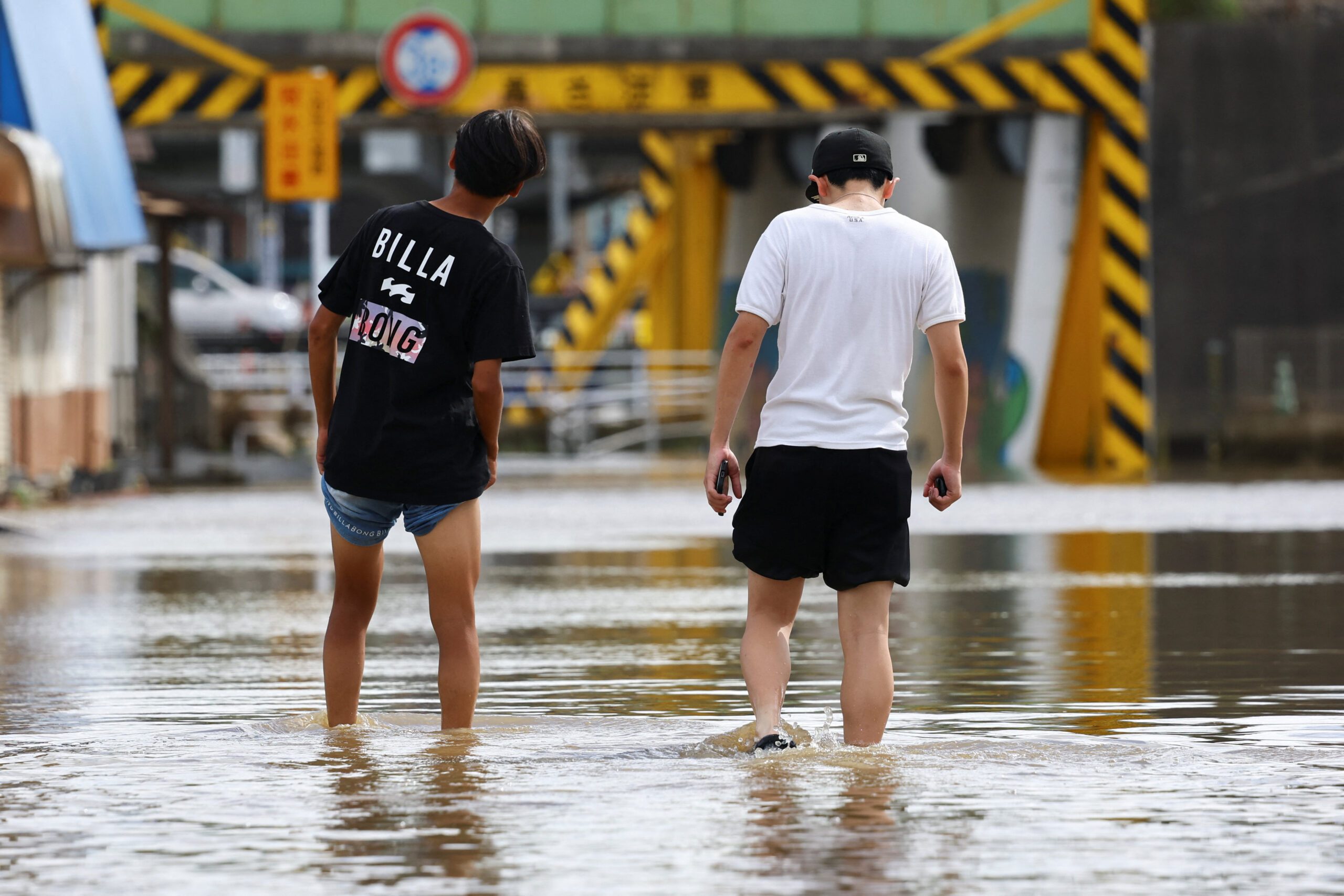 Record Japan Rains Kill Eight and Strand 7,000 at Narita Airport