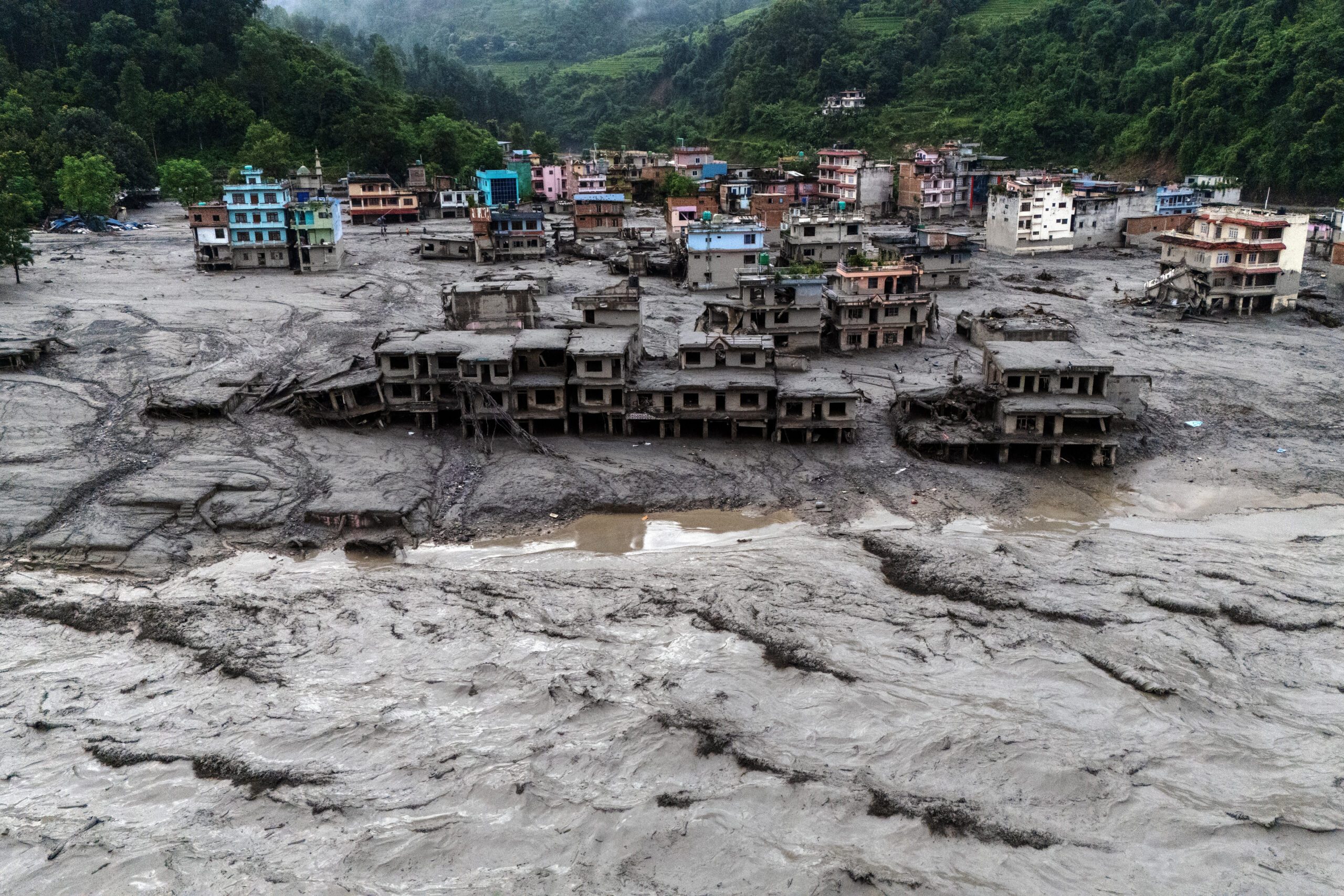 Nepal-Tibet death toll 750 from Himalayan flood, 3,000 missing