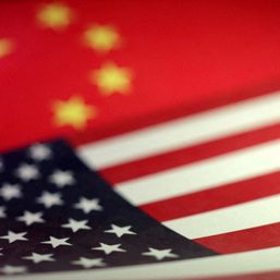 China sends naval forces to monitor US warship near disputed shoal