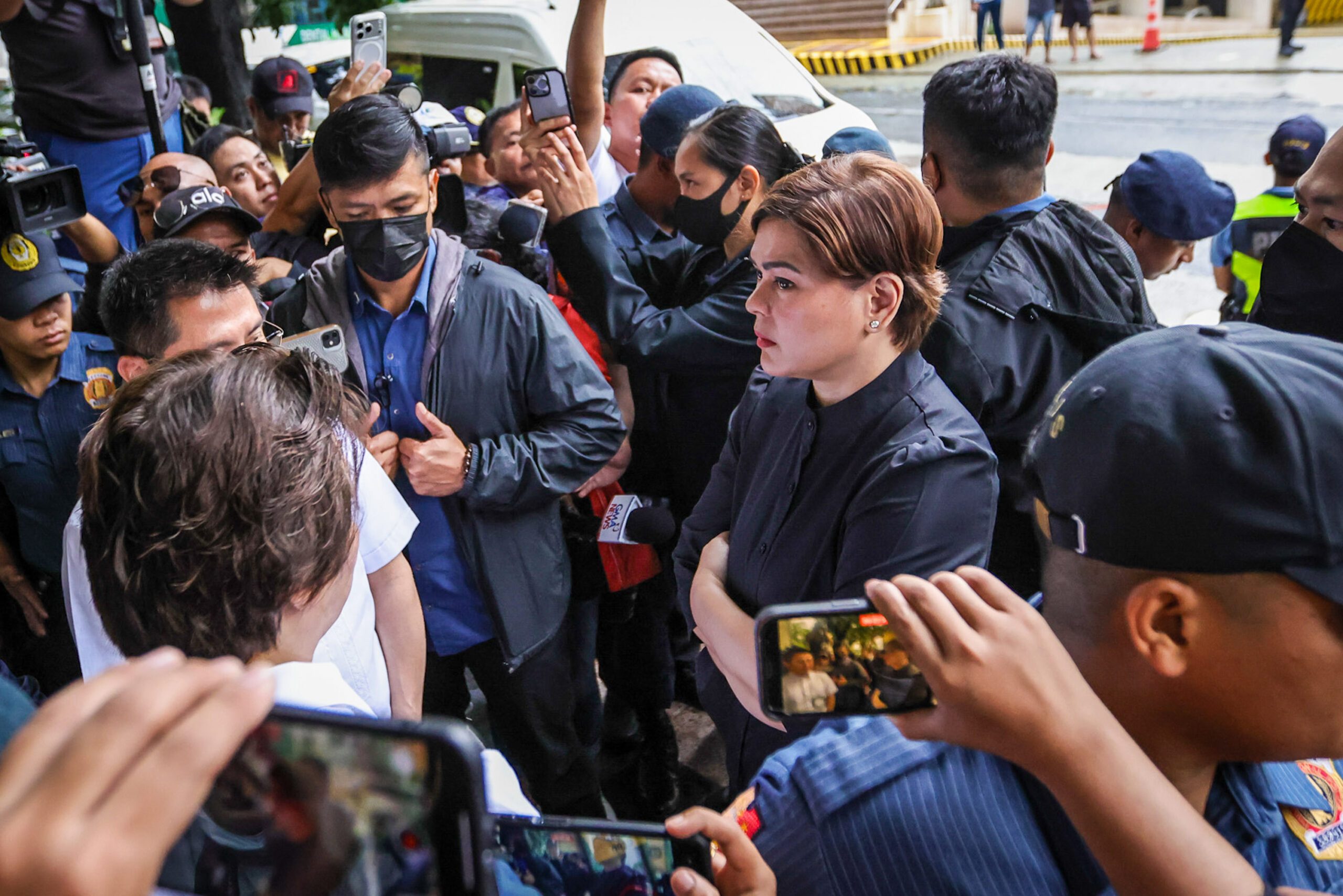 Vice President Sara Duterte arrives at the Quezon City RTC