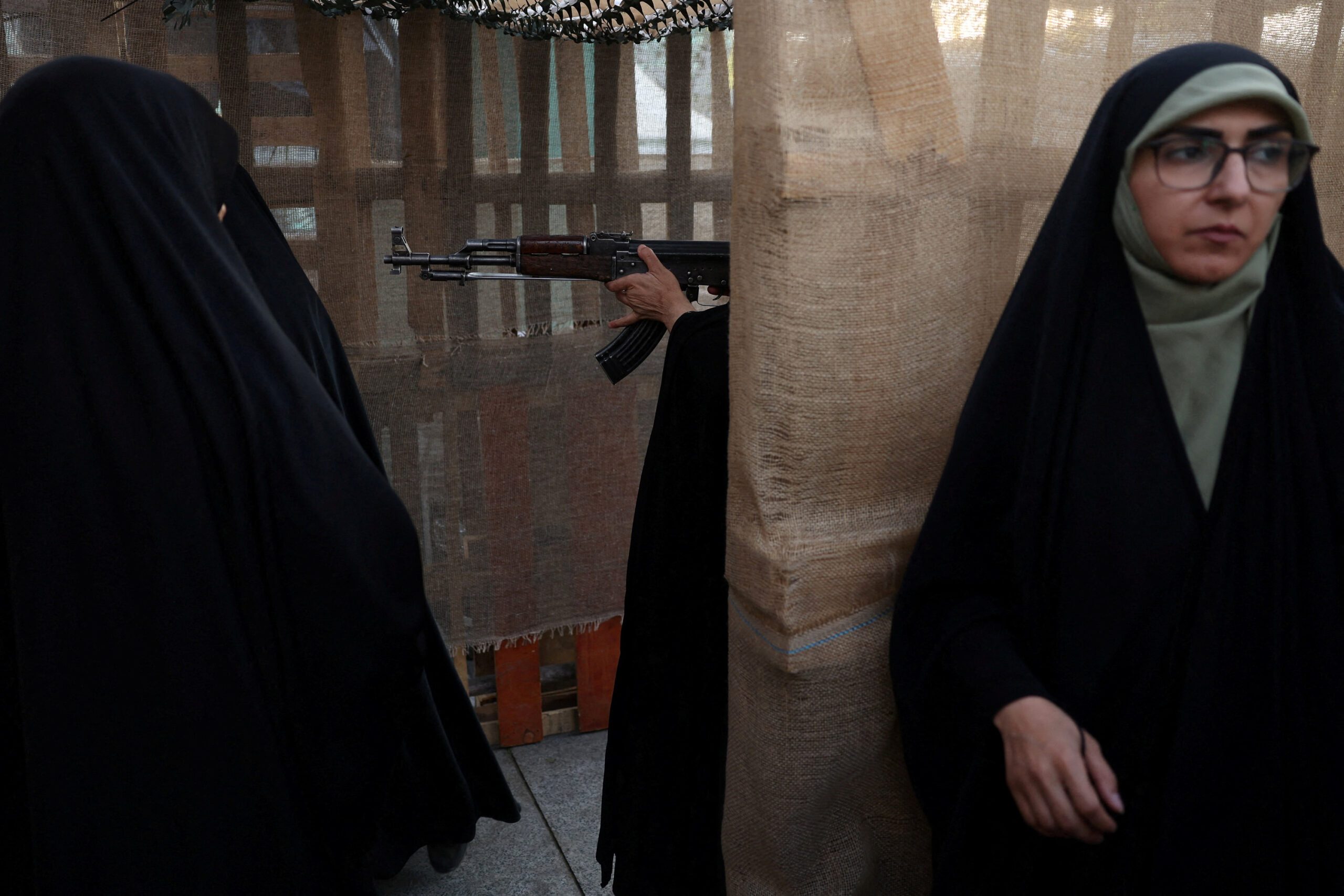 Iranian women volunteers receive military training at a military training center for ordinary citizens at Imam Hussein Square in central Tehran
