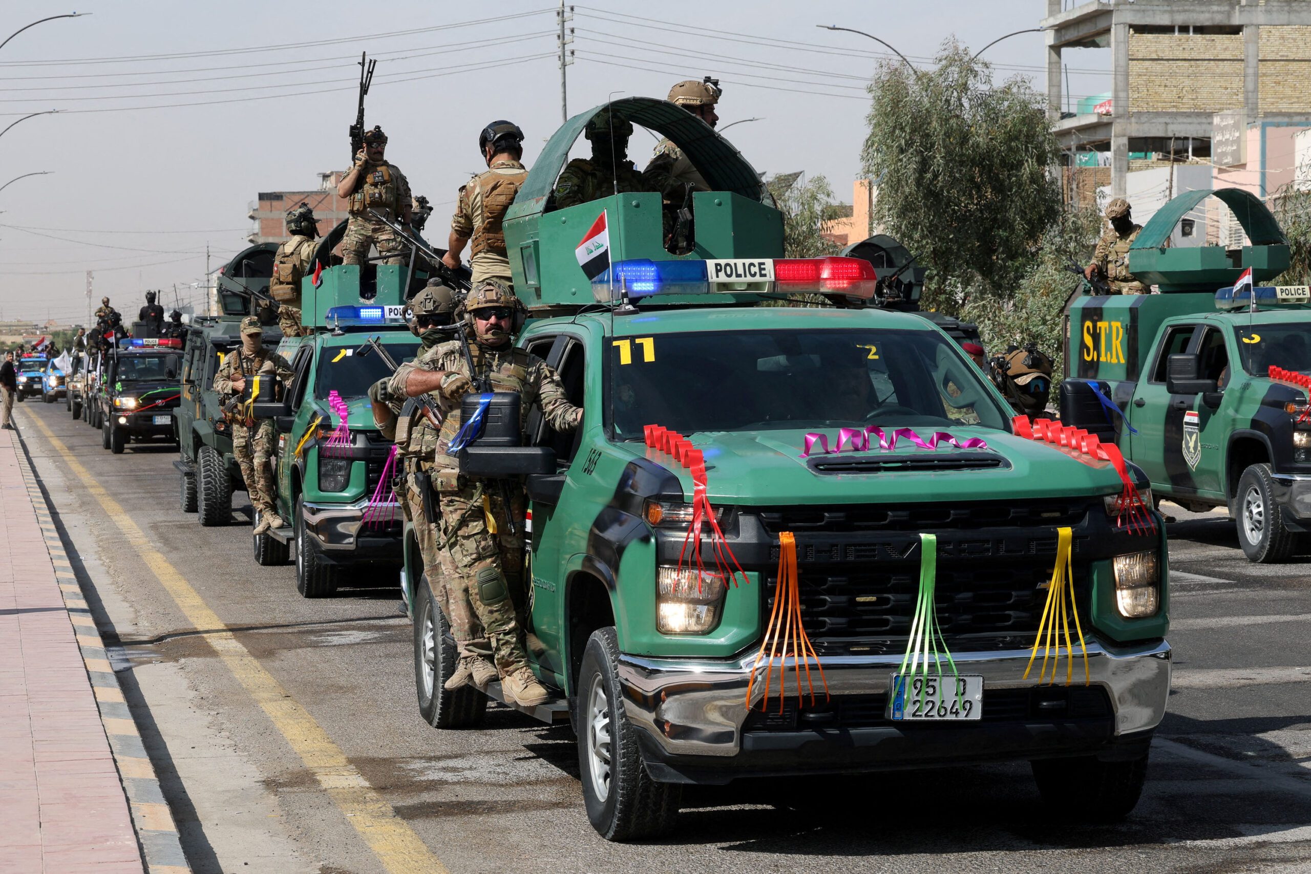 Celebrations after the withdrawal of US-led coalition forces from Iraq, in Najaf