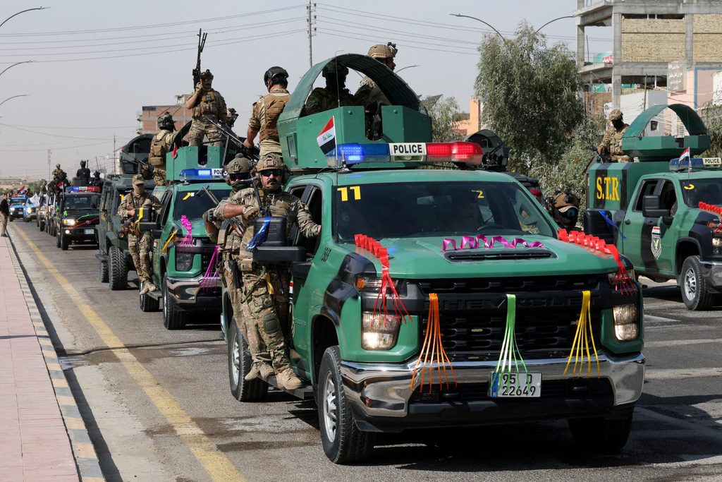 Celebrations after the withdrawal of US-led coalition forces from Iraq, in Najaf